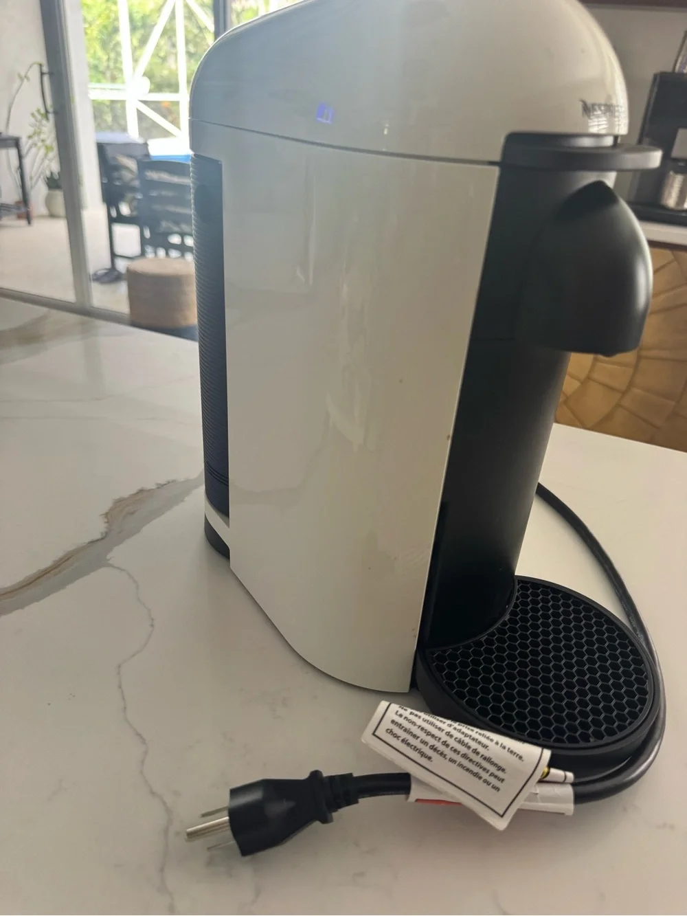 Nespresso Vertuo Plus Machine in White and Black. Used a few months.